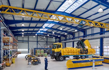 Demag DMR wire rope hoist lifting on a Demag V-Girder crane