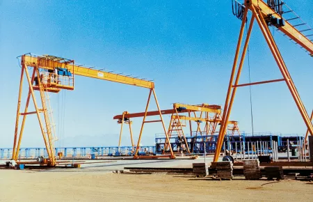 Full-portal cranes