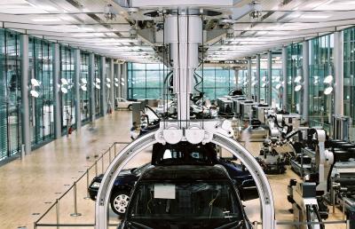 Exact positioning of car bodies in an assembly line in the automotive industry