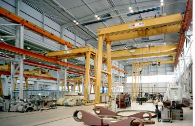 Crane sets for double-girder semi-portal cranes