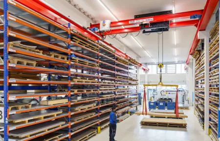 Two cranes facilitate the handling of raw material at EUGEN ARNOLD GmbH in Aichtal.