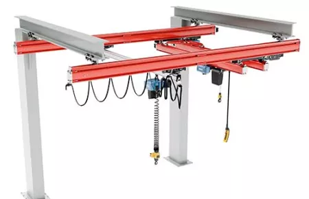 Demag Cantilever Workstation Crane with steel KBK runway and bridges with DC chain hoists for lifting.